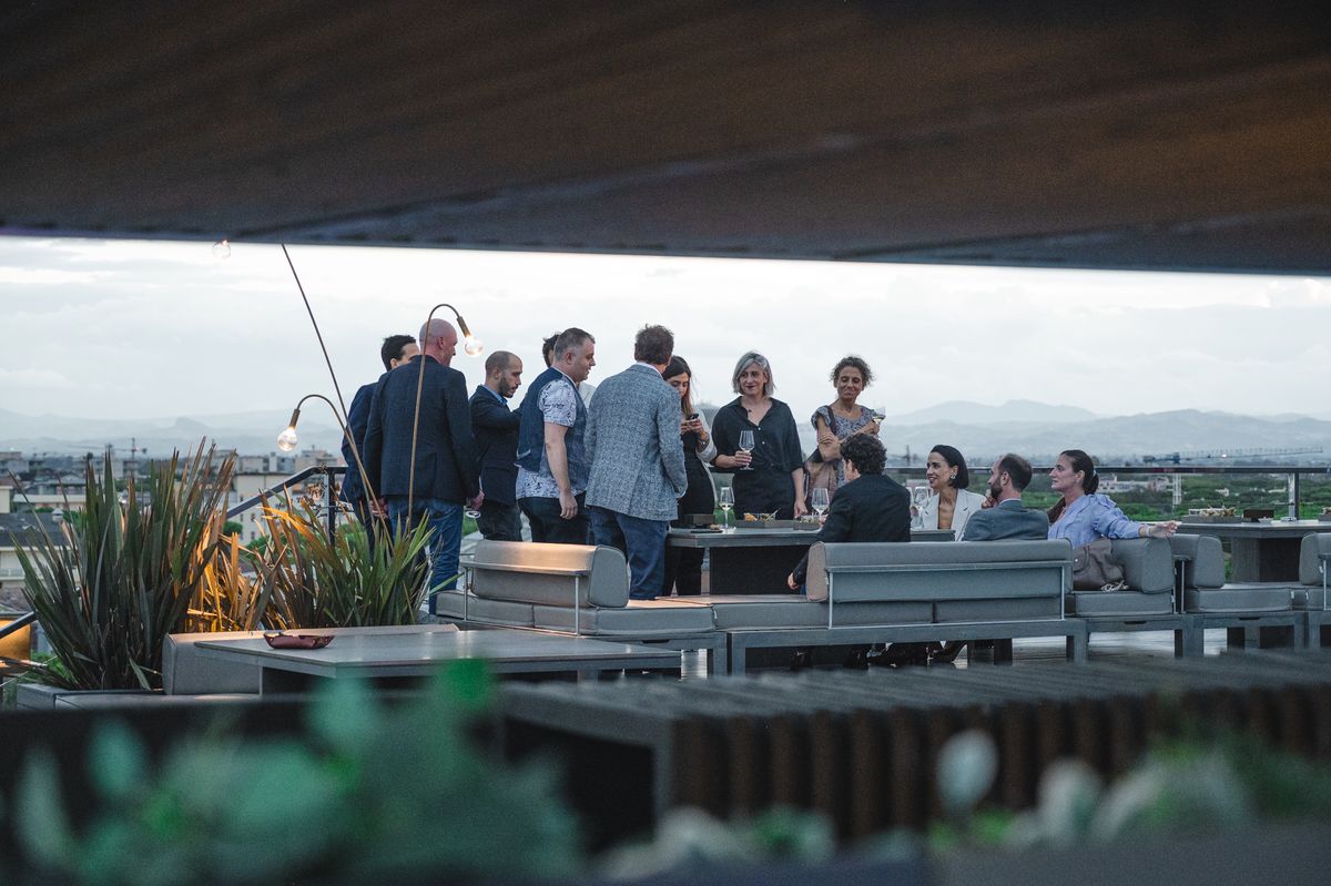 Warm rooftop bar interior at night